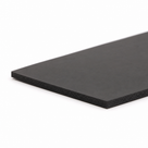 Black rubber sheet corner shown at an angle, studio shot
