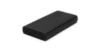 Flat black sponge rubber strip with rounded edge, cut end showing porous texture, studio shot