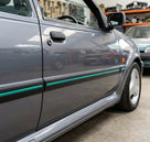 Black door moulding with teal insert fitted to a grey Fiesta RS Turbo's door