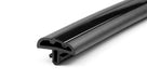 Black door moulding profile with glossy insert channel, angled studio shot