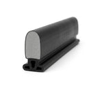 Black rubber sponge section seal with grey foam core, angled length on white background