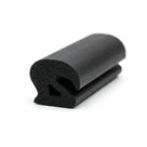 Black sponge rubber seal with hooked fin, angled studio shot on white background