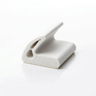 White sponge wrap-over section on adhesive backing, angled studio shot