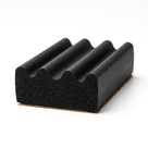 Short black sponge crown strip with corrugated top on adhesive backing