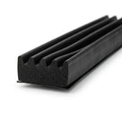 Length of black sponge crown strip with deep corrugated ridges on tape backing