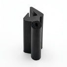 Black dual hardness rubber extrusion standing upright, studio shot