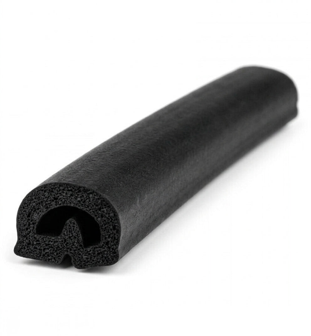 Black rubber boot lid seal, coiled length showing bulb profile, studio shot