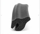 Black rubber boot lid seal, end-on view showing textured D-shaped profile