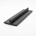 Black knock-on trim shown at an angle with a flat ribbed base plate