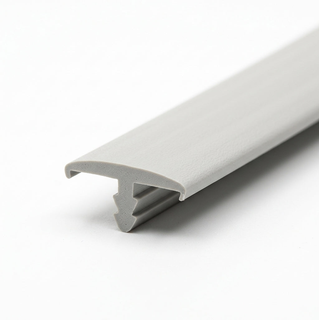 Light grey trim shown at an angle with a single lip and T-shaped fixing clip