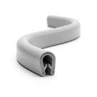 Curved length of light grey PVC edge trim with rubber grip channel underneath
