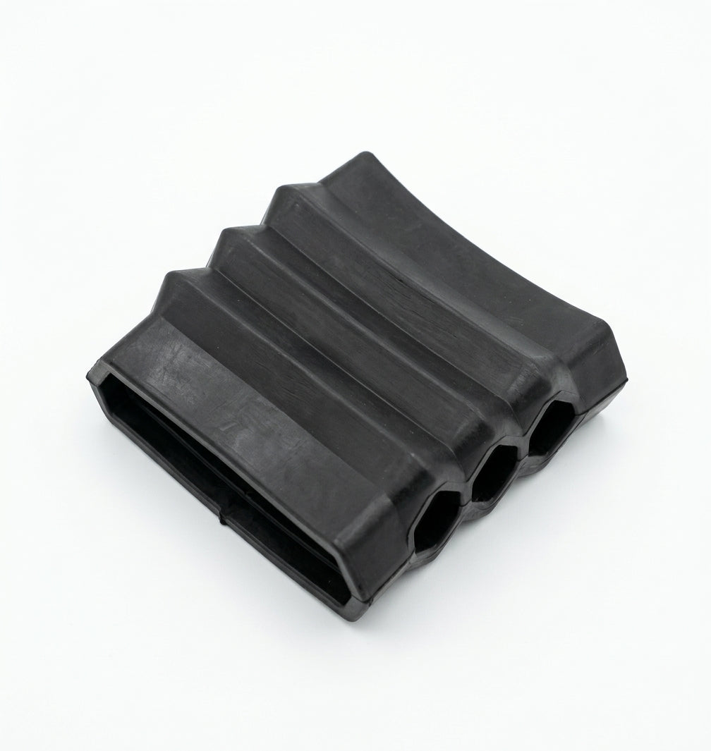 Black ribbed rubber air intake gaiter with accordion pleats, studio shot on white