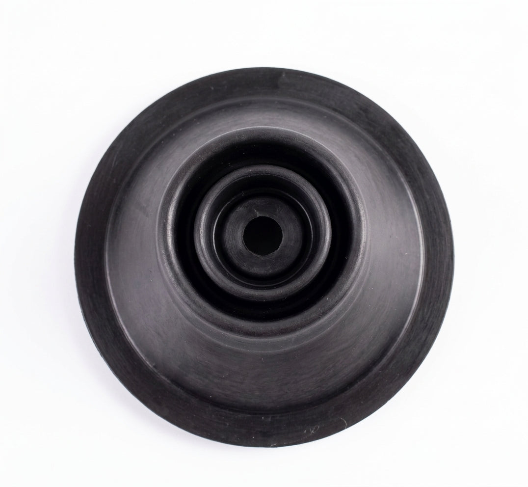 Black rubber gear lever gaiter viewed from above showing concentric rings
