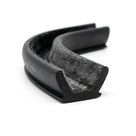 Black EPDM sliding window channel coiled, flocked fibre lining visible inside curved groove