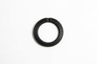 Black rubber sump sealing washer, flat top-down view on white background