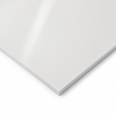 Glossy white sheet corner on white, light streaking across the polished face
