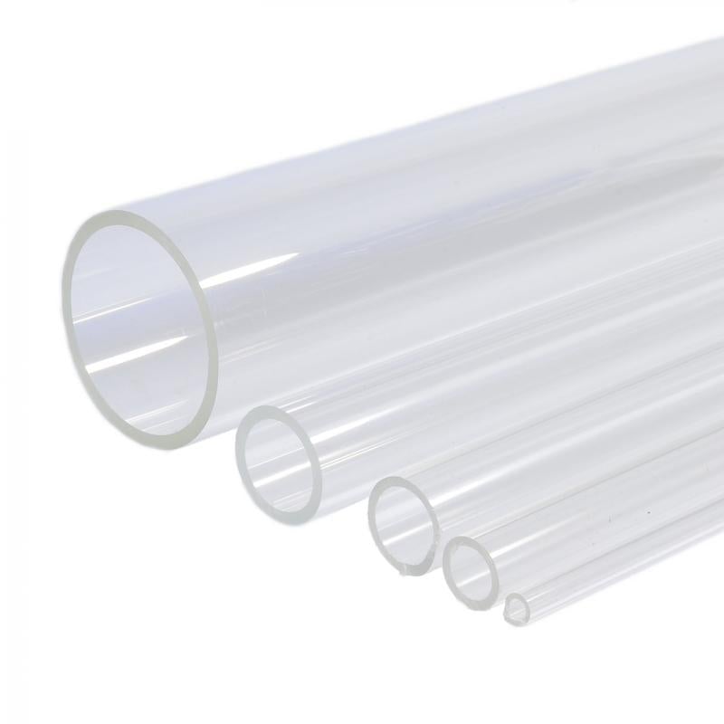 Colourless clear acrylic tubes in five graduated diameters, cut ends towards the camera, plain white studio background.