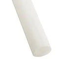 Cropped white acetal rod on a pale background, smooth surface with the rounded end at the top