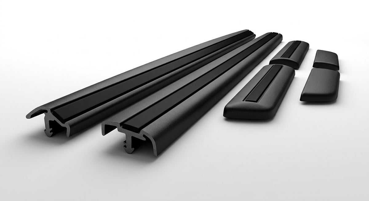 Two long black door moulding strips with matching corner end caps, white background