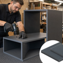 Maker driving a screw into a dark grey uPVC cabinet carcass in a workshop, inset of two grey panels