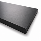 Thick black polyethylene block on white, fine brushed grain across the top face
