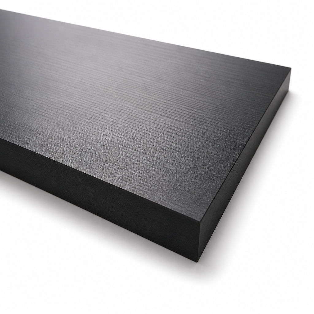 Thick black polyethylene block on white, fine brushed grain across the top face
