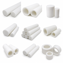 Grid of nine studio shots of white PTFE rods, bored sleeves and rings in assorted diameters on white