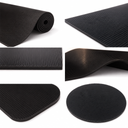 Collage of black fine-ribbed rubber matting shown rolled, flat, flexed and as a round cut disc.