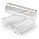 Four clear acrylic tubes in graduated diameters fanned out on white, cut ends towards the camera