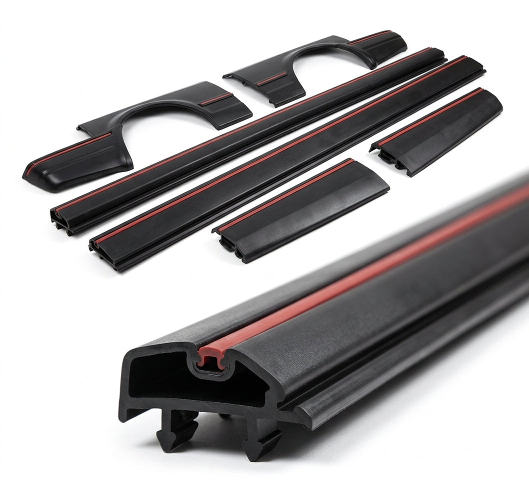 Full set of black door mouldings with red insert stripe and corner caps, studio shot