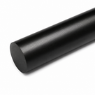 Satin black acetal billet angled on white, lit from above with the sawn end in the foreground
