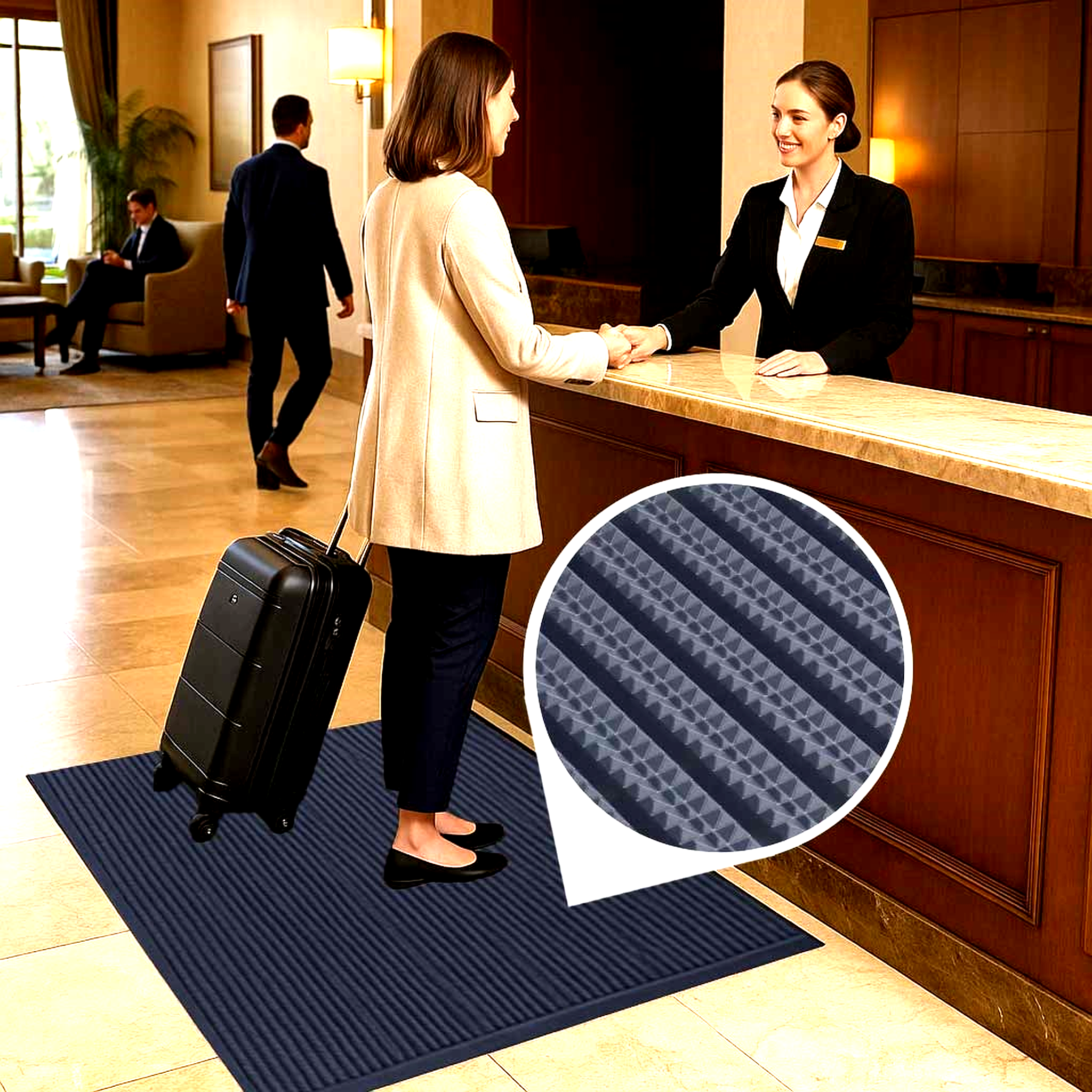 A traveler with a suitcase checks into a hotel, standing on a navy blue ribbed commercial entrance mat near the reception desk. This high-traffic walkway mat is designed for busy lobbies. An inset circle magnifies the mat's striped, patterned texture with alternating thick ribs for scraping dirt and moisture.