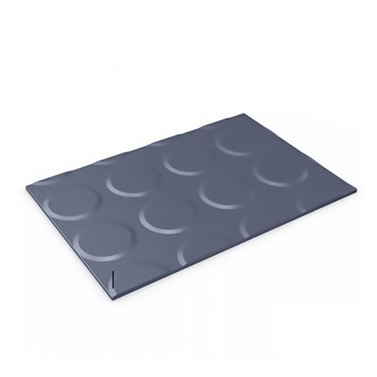 Angled view of a dark grey, rectangular rubber mat with a raised, non-slip circular coin pattern.