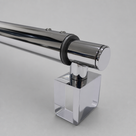 Studio close-up of the round chrome bar end, black trim ring and empty square U-clamp, on a plain grey background.