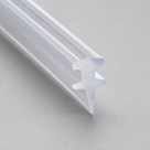 Angled studio view of the clear dual-fit seal, stepped twin T ridges and spike seen along the length