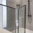Clear seal with a small white oval cap, fitted midway along a glass shower door edge.
