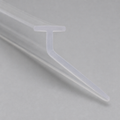 Clear seal at a shallow angle on grey, T-head above a long slim blade sweeping down and away