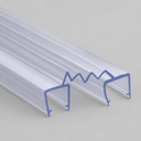 Close studio view of two clear U-channel seals, zigzag top edge outlined in blue for clarity.