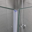 Blue-outlined seal fitted at a glass shower corner where two panels meet.