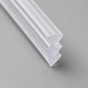 Clear seal with a three-tooth zigzag top edge, diagonal studio shot on grey.
