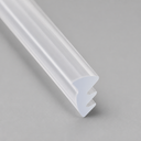 Clear seal with a three-tooth zigzag top edge, diagonal studio shot on grey.