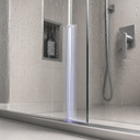 Clear seal fitted vertically at a glass shower door edge, glowing under shower lighting.
