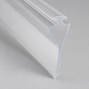 Clear T-top seal with a tapered triangular fin below, diagonal studio shot on grey.