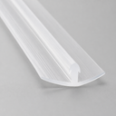 Clear flat-blade seal with a curved arrow-shaped hook foot, studio shot on grey.