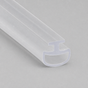 Clear T-seal with an oval-shaped base cavity, diagonal studio shot on grey.