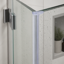 Lilac plain T-seal fitted at a glass shower corner, bottle and plant on shelf behind.