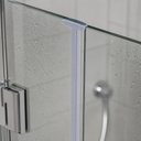 Lilac T-seal fitted at a glass panel hinge corner, chrome shower head visible behind.