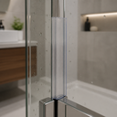 Clear frame seal fitted between two glass door panels, bathroom vanity and plant behind