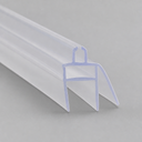 Clear chair-shaped stepped seal outlined in blue, diagonal studio shot on grey.