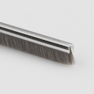 Single length of brush seal, clear ribbed carrier with black rows above short grey bristles